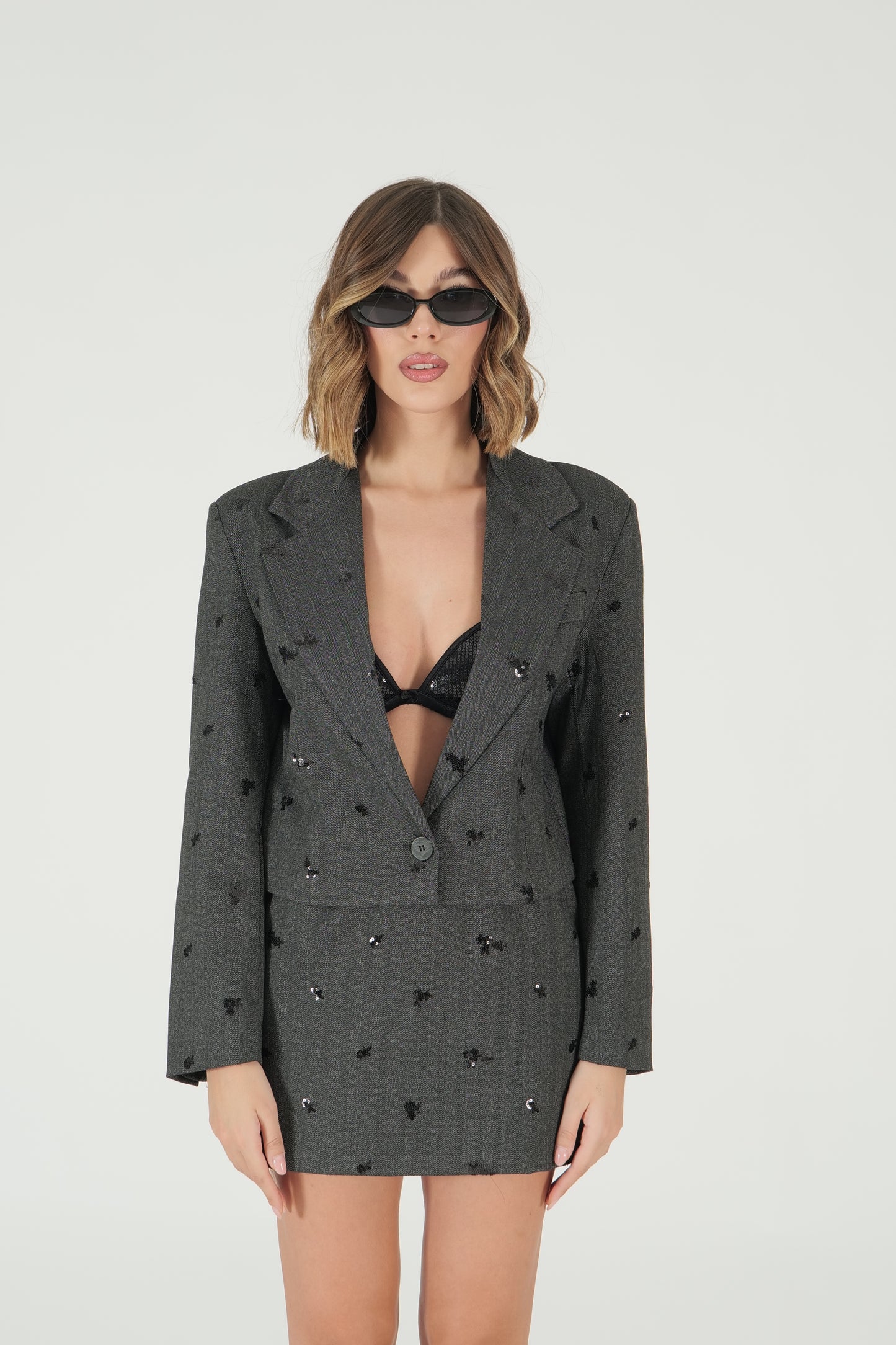 Giacca cropped con paillettes