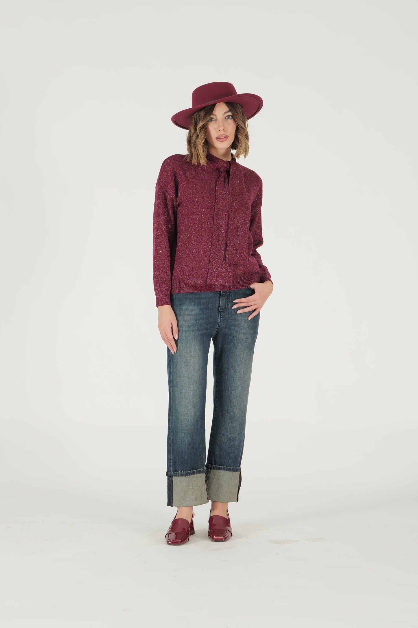 Maglia in lurex con collo a fiocco