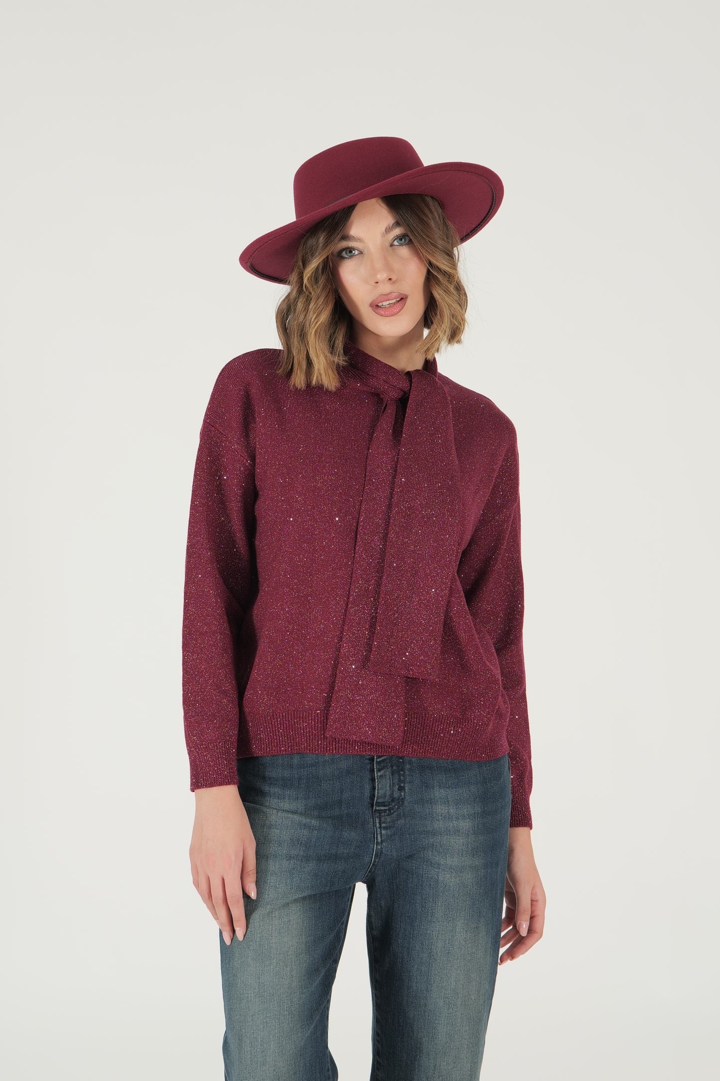 Maglia in lurex con collo a fiocco