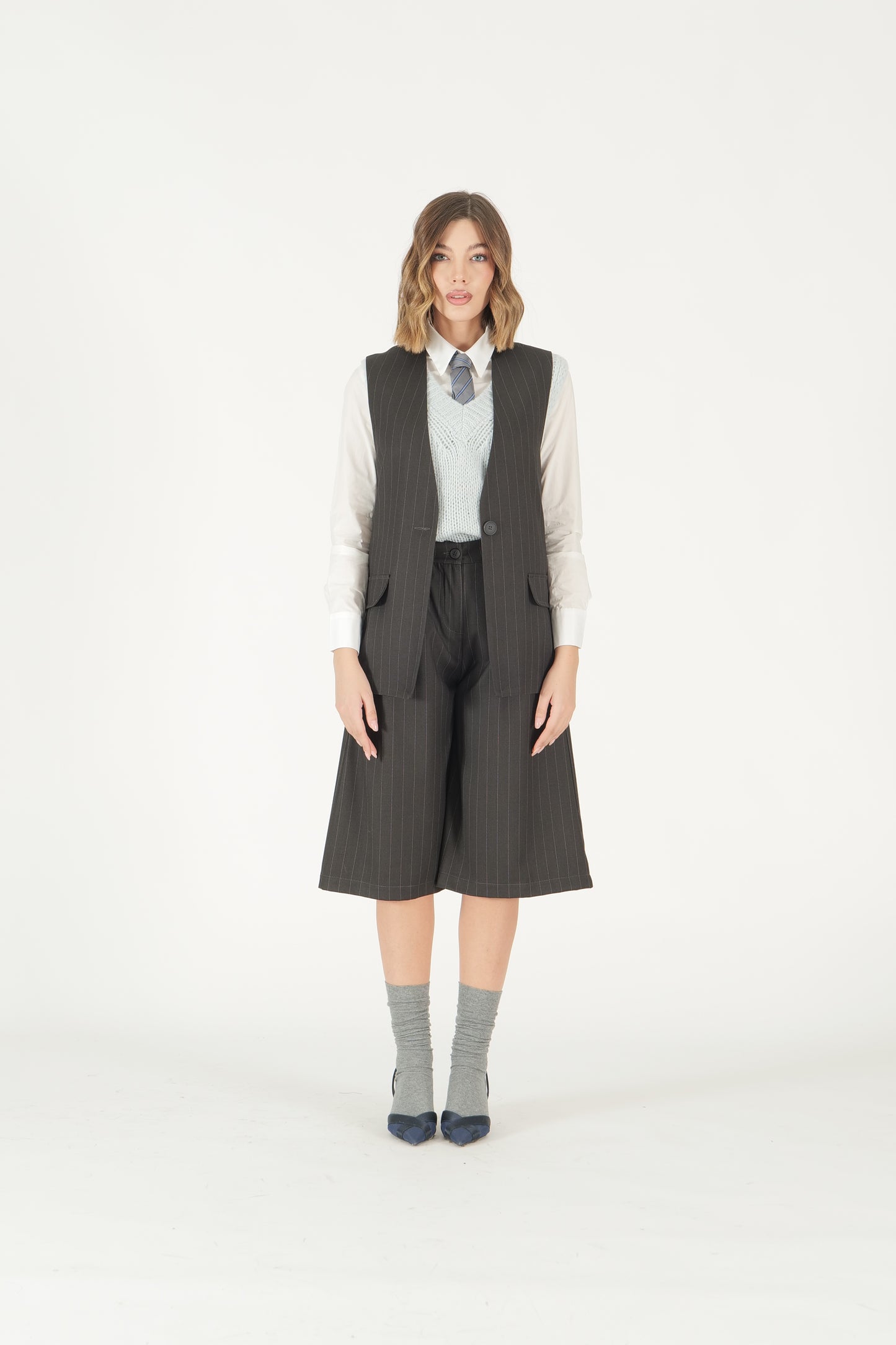 Coordinato gessato gilet e bermuda