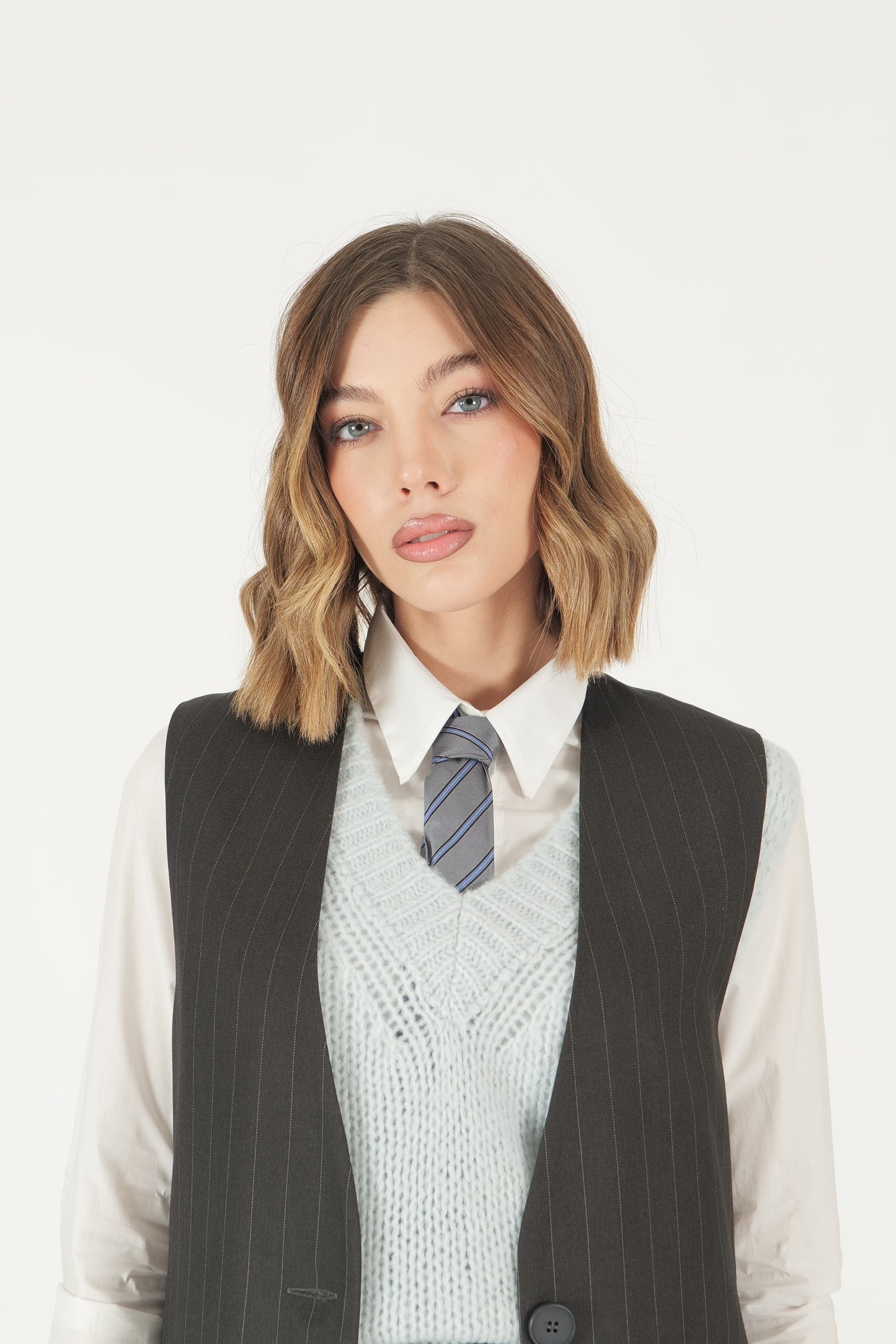Coordinato gessato gilet e bermuda