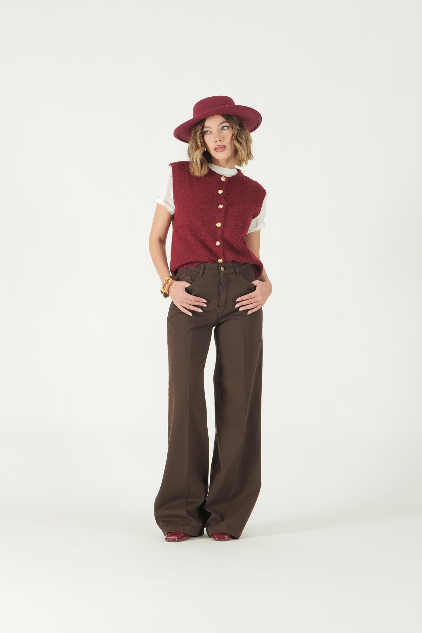 Gilet con bottoni oro