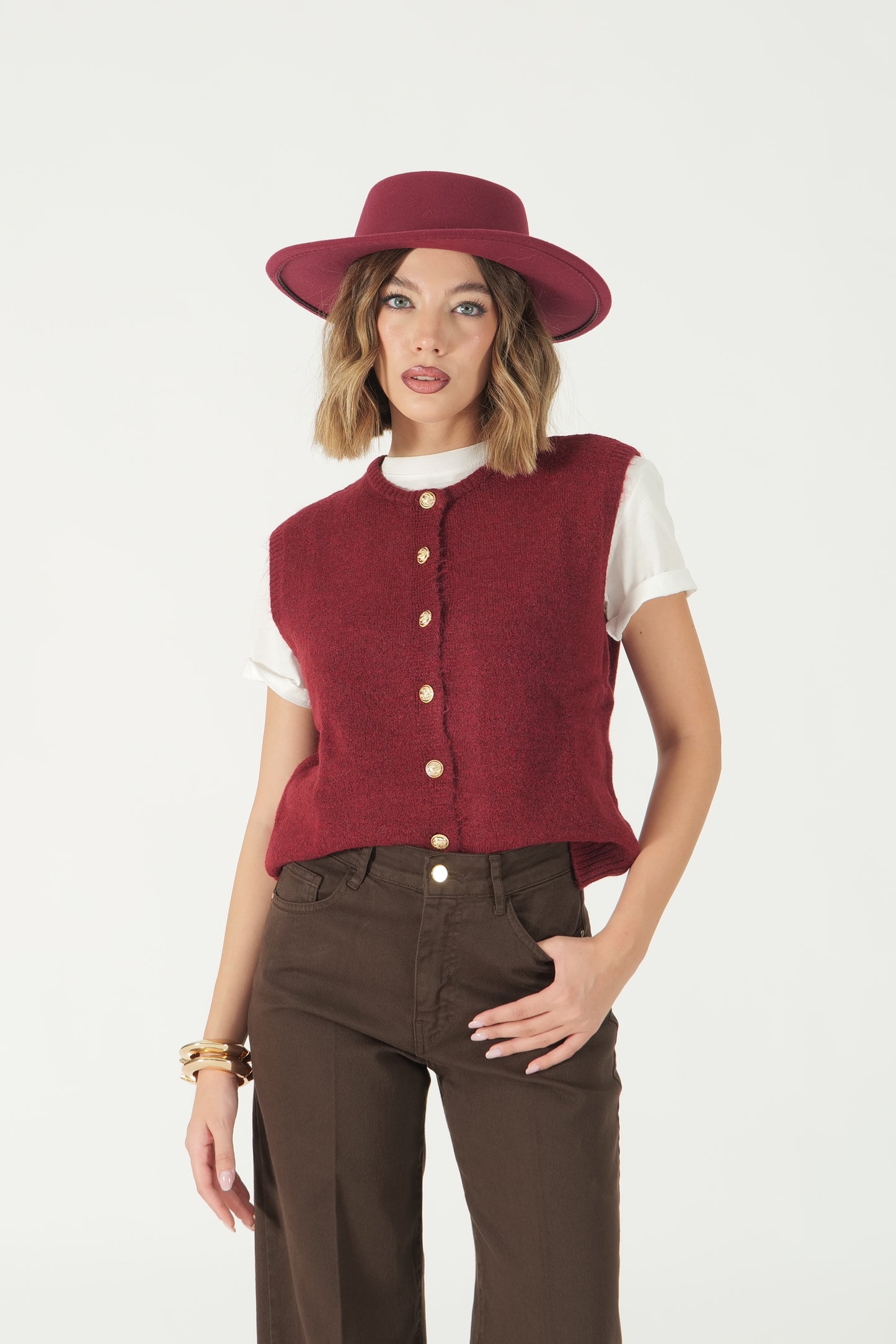 Gilet con bottoni oro