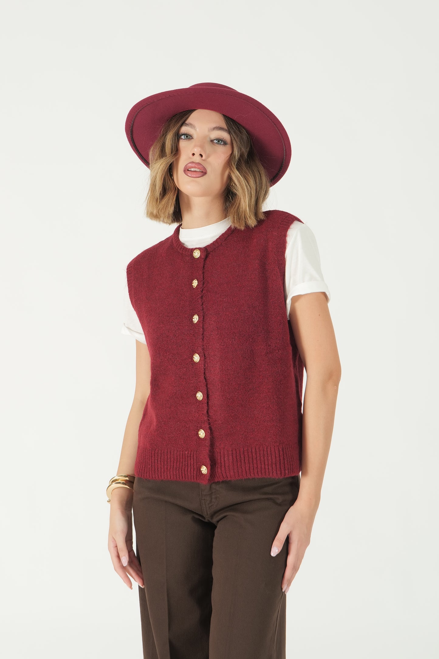 Gilet con bottoni oro