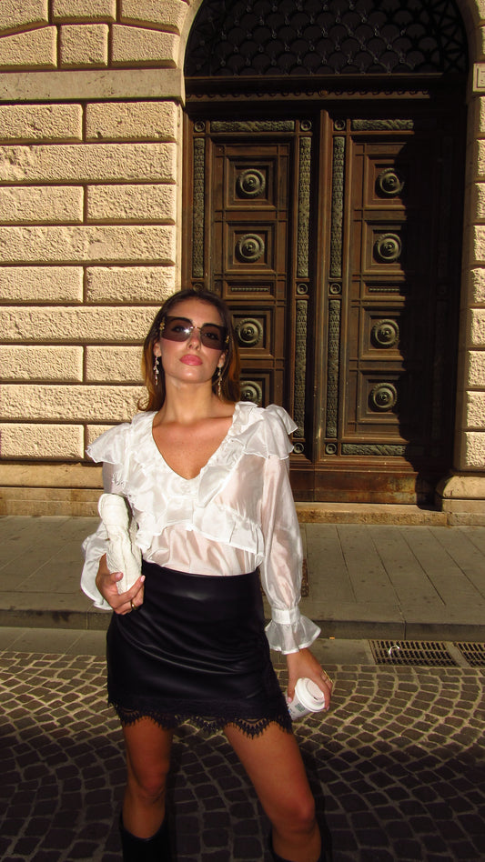 Blusa con volant in voile