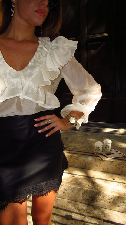 Blusa con volant in voile