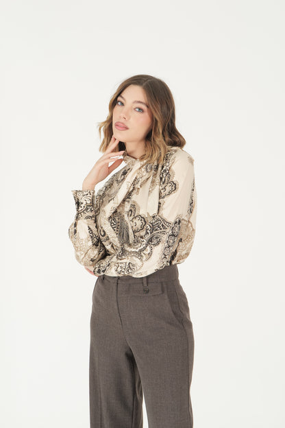 Blusa fantasia con fiocco