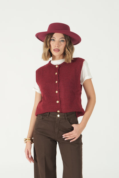 Gilet con bottoni oro