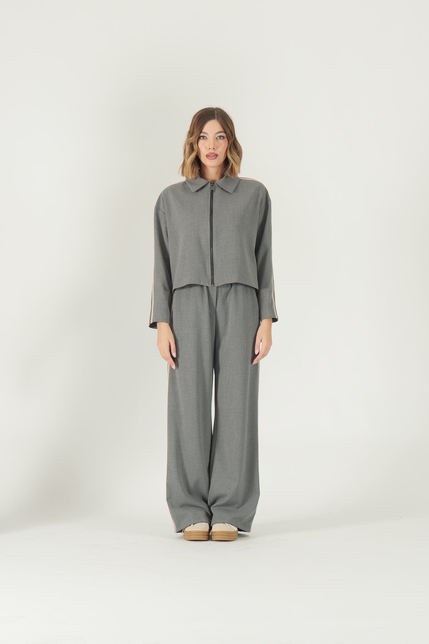 Pantalone con banda laterale