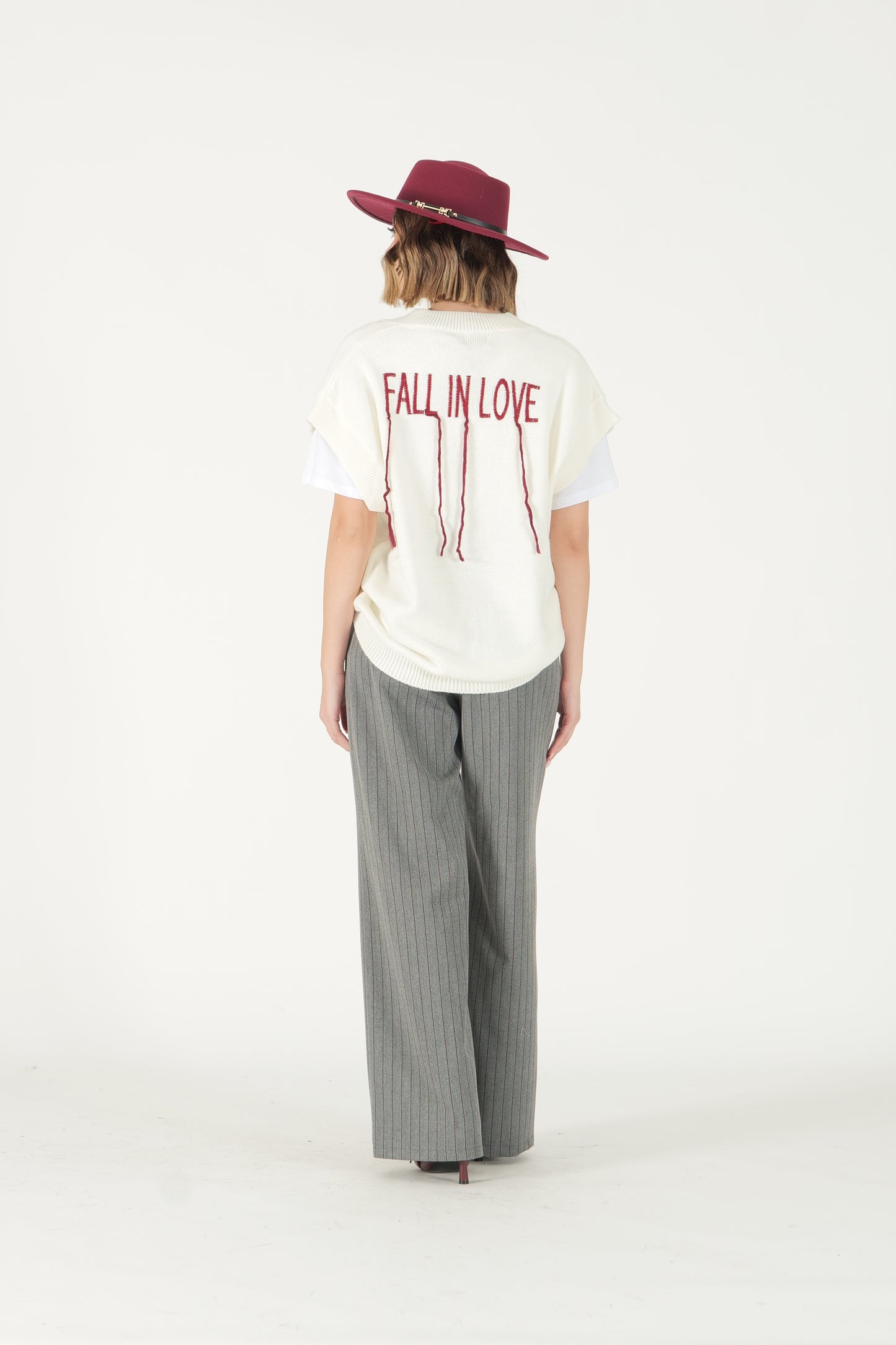 Gilet scollo a V con scritta retro