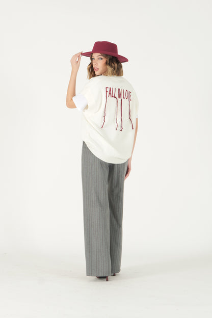 Gilet scollo a V con scritta retro