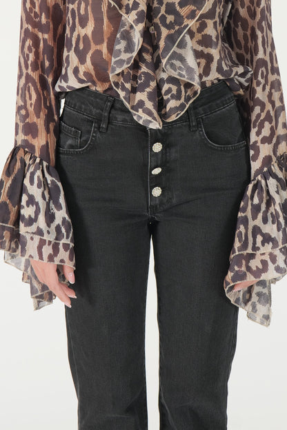 Jeans con bottoni gioiello