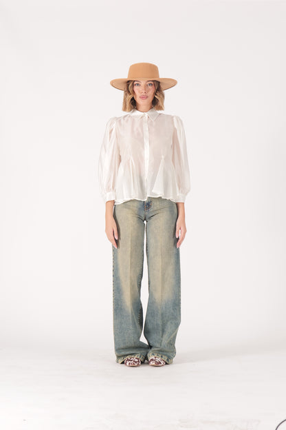 Jeans over sabbiato